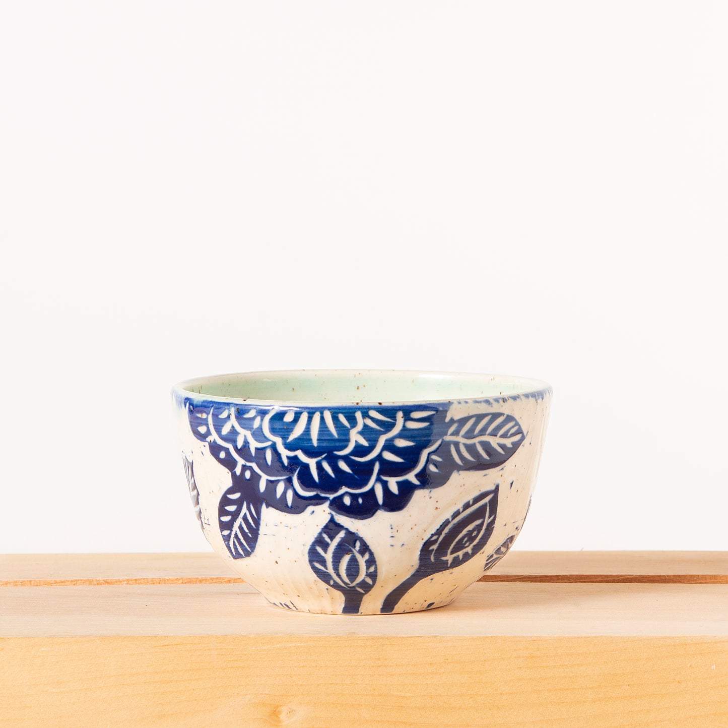 Everything Bowls with blue carved flowers